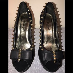 Herstyle black and gold studded high heel with bow